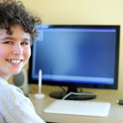 Child doing online speech therapy as opposed to in person