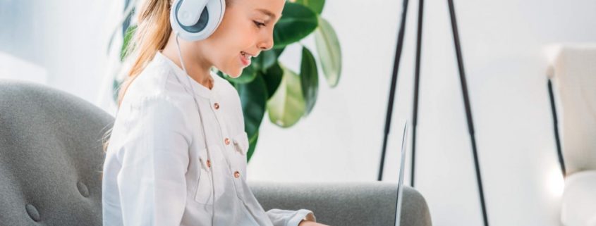 a child on a computer with a language disorder