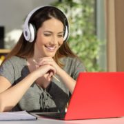 a woman uses online speech therapy to improve grades