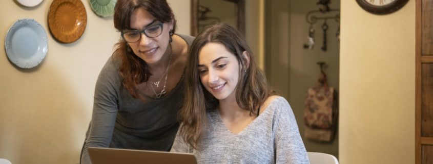 a mother helping a child that has ADHD