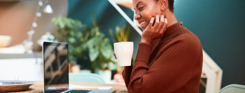 a woman with a stutter on her laptop