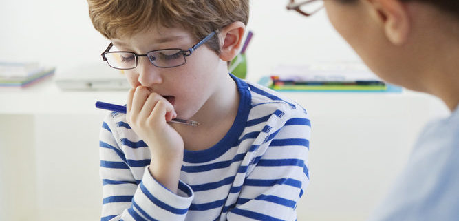 child with a speech therapist