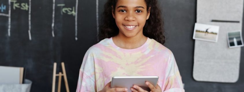 a child doing online speech therapy from home