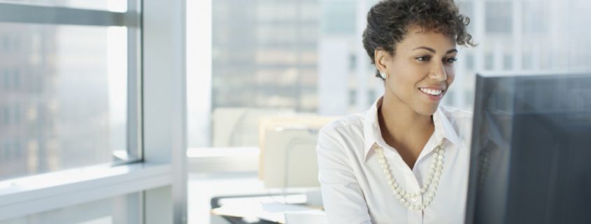 woman doing online speech therapy from her office