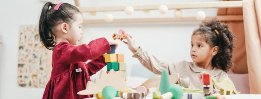 2 year old children playing with blocks