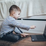 a child learning at a computer