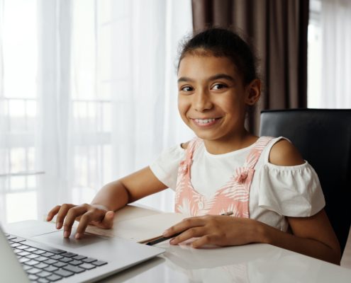 6 year old at home on a computer