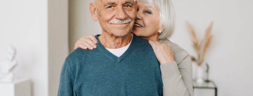 an older couple smiling